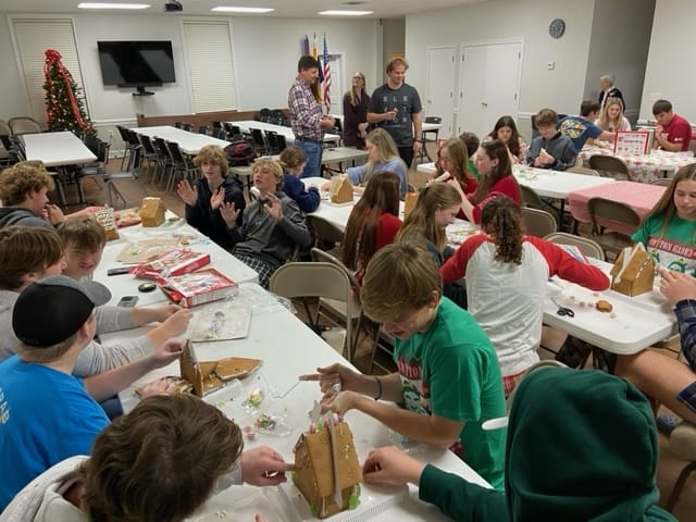 a child is drawing on a piece of paper
