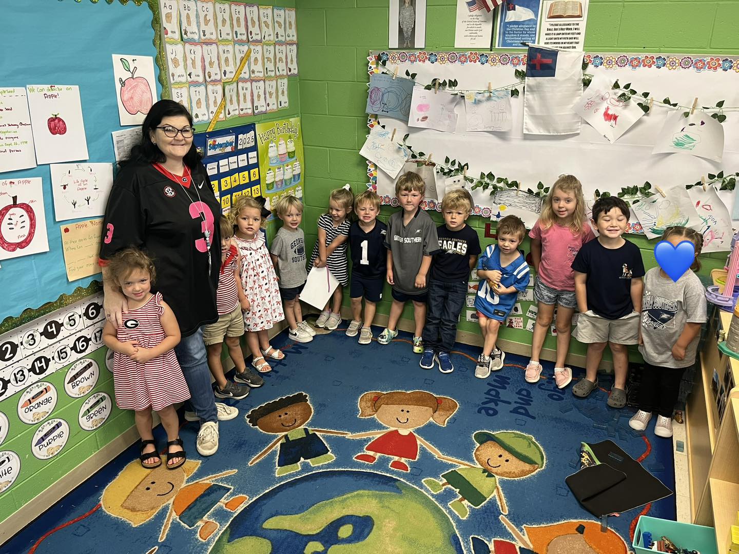 a child is drawing on a piece of paper