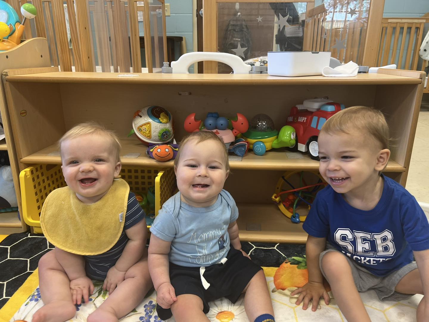 a child is drawing on a piece of paper