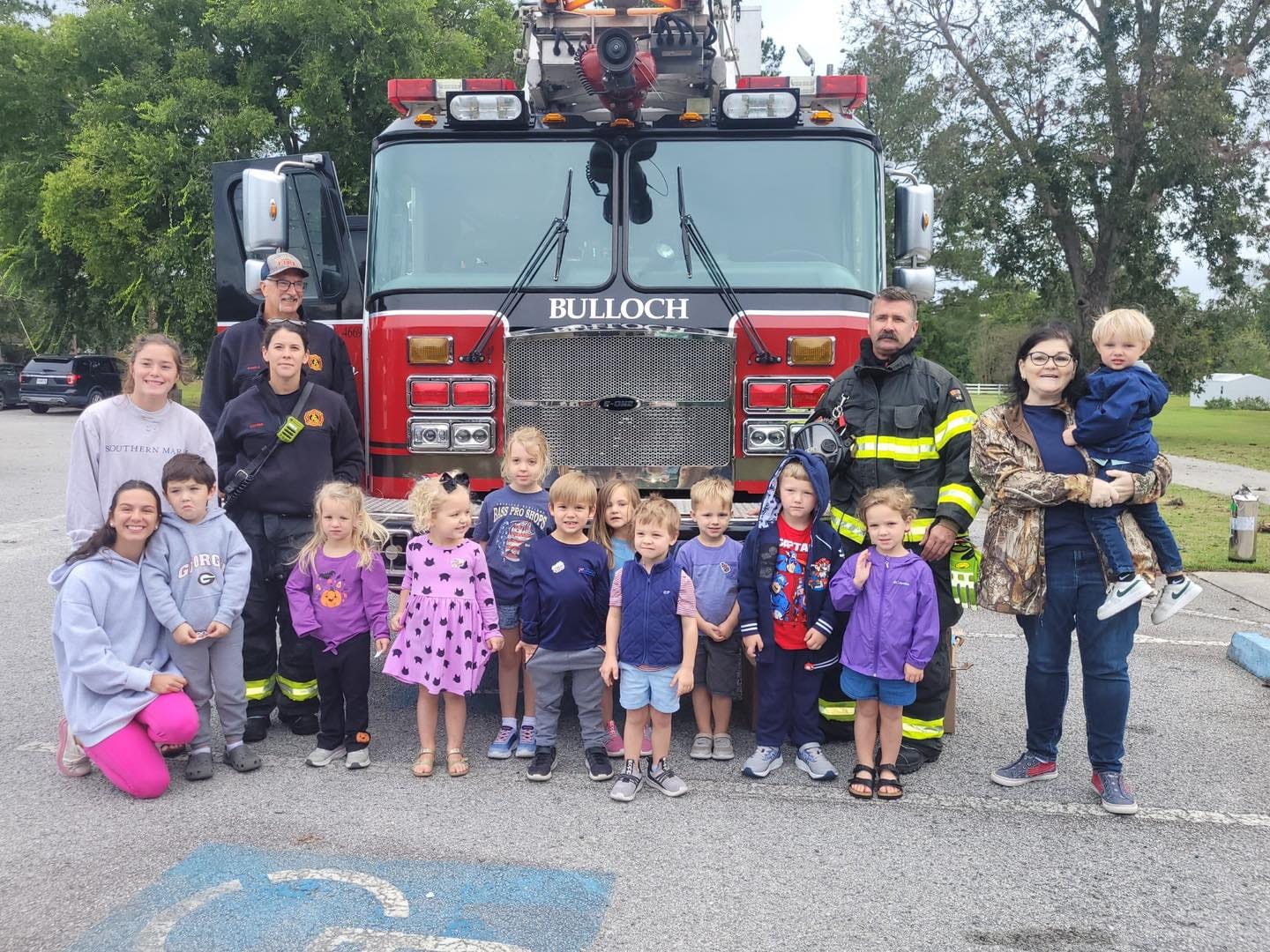 a child is drawing on a piece of paper